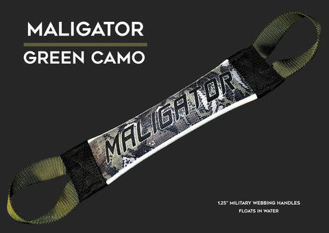 The Maligator Fire Hose Training Tug - Camo Series by Bulletproof Pet Products Inc features green camo handles with black and olive loops, 12.5 military webbing handles, floats in water, and is perfect for dog training tug sessions.