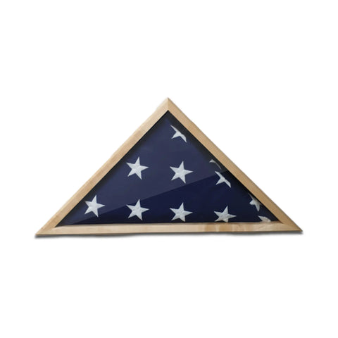 A folded American burial flag with white stars on a blue field, displayed in the Maple 4x6 Flag Display Case by Legacies of America Woodworking Company against a white background.