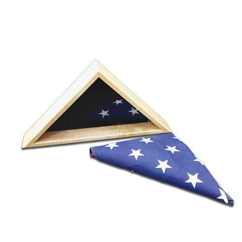 A folded American flag with white stars on blue rests beside the Maple 4x6 Flag Display Case by Legacies of America Woodworking Company—an ideal way to honor and display a burial flag behind a glass front.