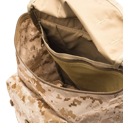 The MIS Backpack - MarPat Desert features tan camouflage Cordura Nylon, interior compartments with a mesh zip pocket and padded laptop holder. Its water-resistant design is perfect for everyday use. Photographed against a white background.