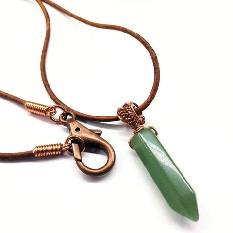 Alexa Martha Designs Mens Rustic Wire Wrapped Pointed Gemstone Crystal Leather Necklace features a green double-pointed crystal pendant with copper wire accents on a brown leather cord—a stylish, handcrafted piece for any occasion.