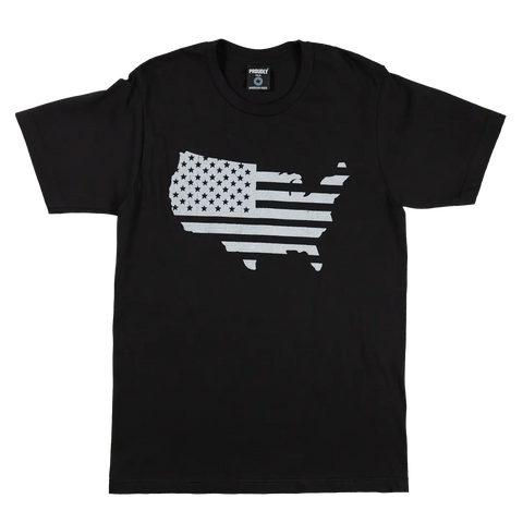 The Land That I Love Mens Cotton T-Shirt by Proudly USA features a black design with the U.S. outline filled by a grayscale American flag across the chest.