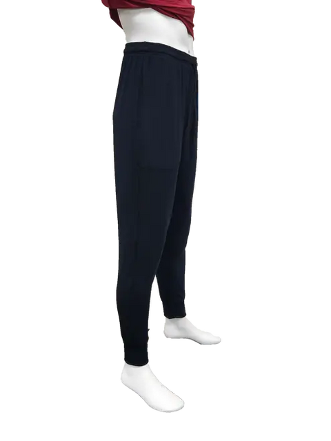 A mannequin in side view wears black Goodnighties Mens Jogger Pants made in the USA with 37.5 technology, elastic waistband, and tapered legs, plus a maroon top; mannequin’s face and hands are not visible.