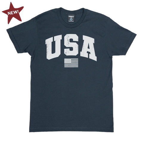 Show your Team USA spirit in the Proudly USA Team USA Mens Cotton T-Shirt (Navy), featuring bold white USA text, a small white flag below, and a red NEW! star on American-grown cotton.