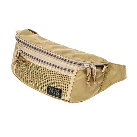 The MIS Mesh Waist Bag - Coyote Tan is crafted from durable Cordura nylon, featuring a front military mesh pocket, two zipper compartments, beige zipper pulls, an MIS label, and an adjustable, detachable waist strap for versatility.