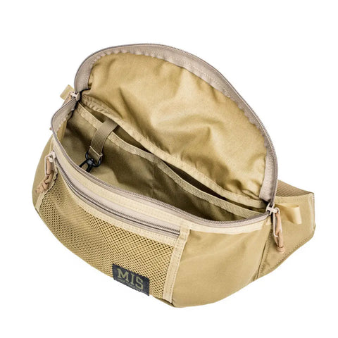The MIS Mesh Waist Bag - Coyote Tan is crafted from rugged Cordura Nylon with a front mesh zip pocket, large main compartment, inside clip, adjustable strap, and front MIS label for a practical and stylish design.