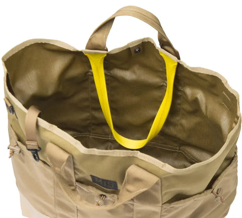 The MIS Multi Pocket Tote Bag in Coyote Tan, made from tough Cordura nylon, features dual handles and yellow inner straps; its shown from above open to display its roomy interior and durable fabric.