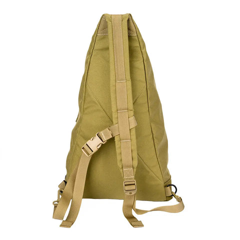 The MIS TA One Shoulder Bag in Coyote Tan is shown from the back, featuring two adjustable shoulder straps, a clip buckle for support, water-resistant Cordura nylon construction, a simple triangular shape, and is made in the USA.