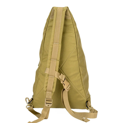 The MIS TA One Shoulder Bag in Coyote Tan is shown from the back, featuring adjustable shoulder straps, a top handle, and buckles at the bottom. This water-resistant Cordura nylon bag has a simple, triangular design.
