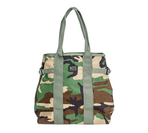 The MIS Multi Tote Bag - Woodland Camo is a durable Cordura Nylon bag with two handles, multiple pockets, and MIS embroidered on the front—ideal for everyday use.