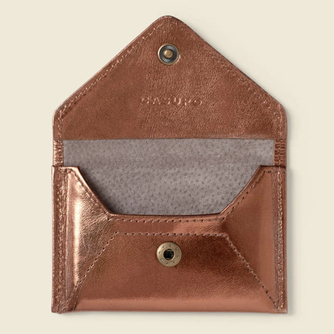 The CASUPO Mini Envelope Wallet With RFID Protection in bronze features eco-friendly leather, a snap closure, a suede-like interior, and an inside pocket.