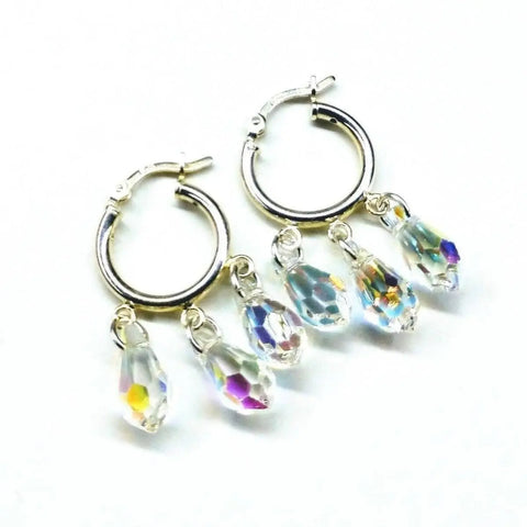 The Sterling Silver Hoop Sparkly Crystal Drop Dangle Earrings by Alexa Martha Designs feature three shimmering faceted crystal beads on each hoop.