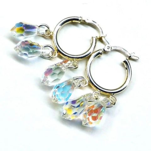Alexa Martha Designs Sterling Silver Hoop Sparkly Crystal Drop Dangle Earrings feature three dazzling, faceted teardrop crystals per hoop that reflect a rainbow of colors. Photographed against a plain white background.