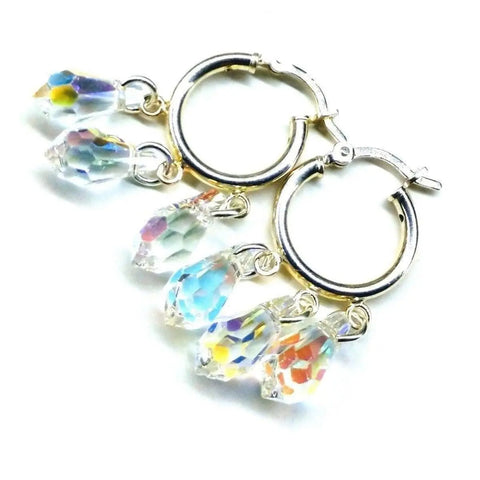 Sterling Silver Hoop Sparkly Crystal Drop Dangle Earrings by Alexa Martha Designs feature three rainbow-hued faceted crystal charms on each handmade hoop, capturing light beautifully. Shown on a white background.