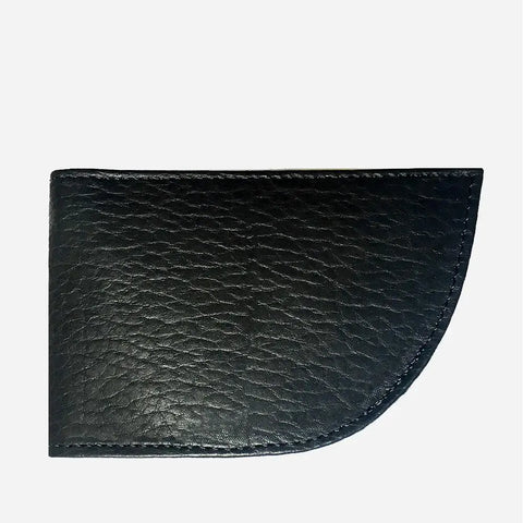A Rogue Industries Nantucket Bison Leather Front Pocket Wallet with a textured black finish and a curved bottom right corner, shown on a plain white background.