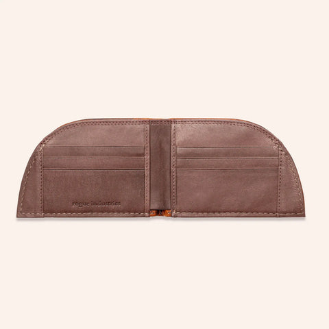 The Rogue Industries Rogue Front Pocket Wallet - Classic Made in Maine Edition is a brown premium leather bifold with curved edges, multiple card slots, and Rogue Industries embossed inside—perfect for everyday front pocket carry.