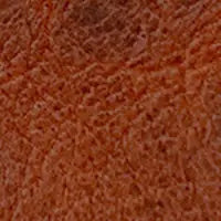 Close-up of a textured brown surface with fine lines and natural patterns—ideal for The Minimalist Wallet by Rogue Industries, a perfect choice for those seeking a stylish front pocket wallet.