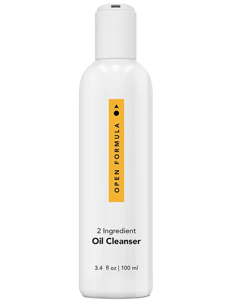 A white bottle of Open Formula Oil Cleanser (3.4 fl oz/100 ml) features a yellow vertical label and flip-top cap. This pore-cleansing oil and makeup remover leaves skin fresh with no oily residue.