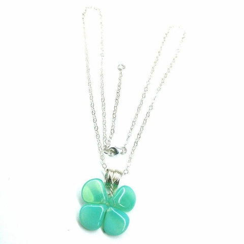 The Alexa Martha Designs Mint Green Beaded Sterling Silver Clover Necklace features a clover pendant with translucent mint green beads, beautifully showcased against a white background.
