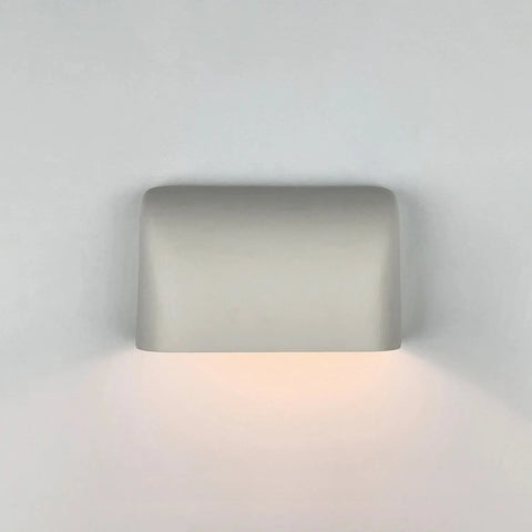The Balboa Downlight Sconce by A19 Artisan Lighting is a handcrafted, minimalist USA-made wall light with a smooth, rectangular form and soft downward glow—ideal for LED smart bulbs and modern spaces.