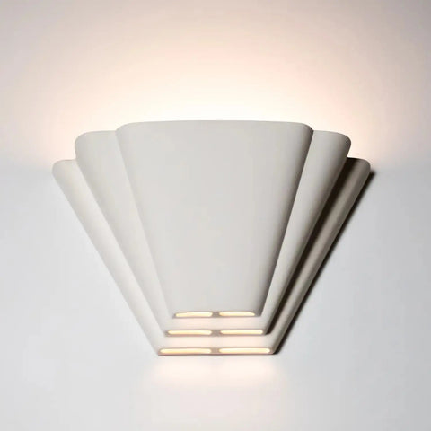 A white, geometric-shaped Bermuda sconce flush wall light with an up-and-down light pattern.