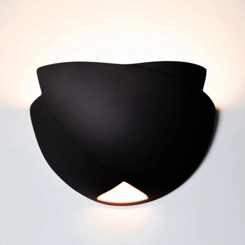 The Modern USA-Made Wall Lighting – Ceylon Sconce by A19 Artisan Lighting features a smooth, curved design that casts an upward glow and a subtle downward beam. Each sconce is expertly handcrafted in California.