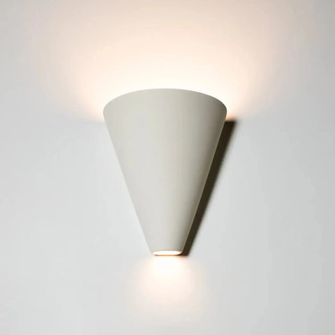 The Modern USA-Made Gotlandia Sconce by A19 Artisan Lighting is a handcrafted, cone-shaped white wall light from California that uses energy-efficient LEDs to cast a soft up-and-down glow on any space.