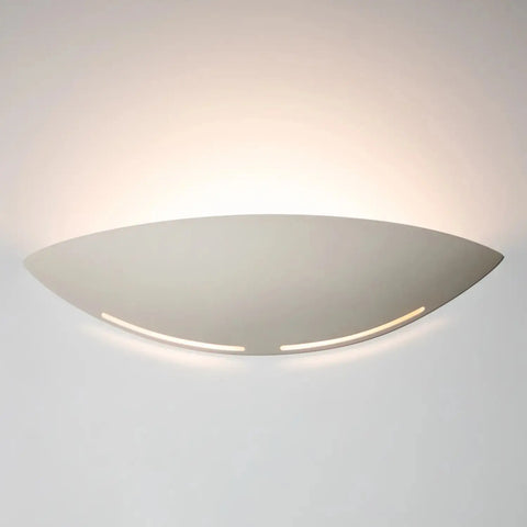 The Modern USA-Made Wall Lighting – Kauai Sconce by A19 Artisan Lighting features a curved white shade that casts a gentle upward glow and is compatible with LED smart bulbs. Handcrafted in California for a modern, elegant touch.