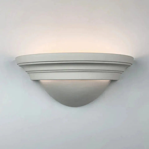 The Modern USA-Made Majorca Sconce by A19 Artisan Lighting is a handcrafted, white ceramic wall fixture from California, featuring a layered semi-circular design and energy-efficient LED for a soft upward glow.