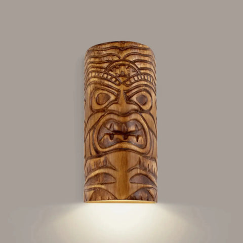 The Modern USA-Made Wall Lighting – Tiki Downlight Sconce by A19 Artisan Lighting is handcrafted in California, featuring a traditional Tiki face design for soft, downward light—perfect for adding character to your Nature Collection.