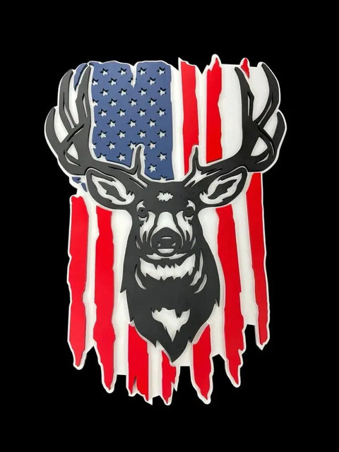 The Mule Deer Rustic Flag Sign by B. James Design & Woodwork features a black silhouette of a deer head with large antlers over a distressed American flag on a black background—ideal rustic decor or 3D floating wall art for any space.