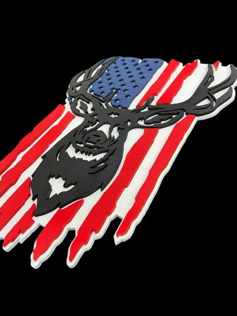The Mule Deer Rustic Flag Sign by B. James Design & Woodwork features a black mule deer head silhouette over a distressed American flag, set on a striking black background—perfect as a 3D floating wall hanging for rustic decor.