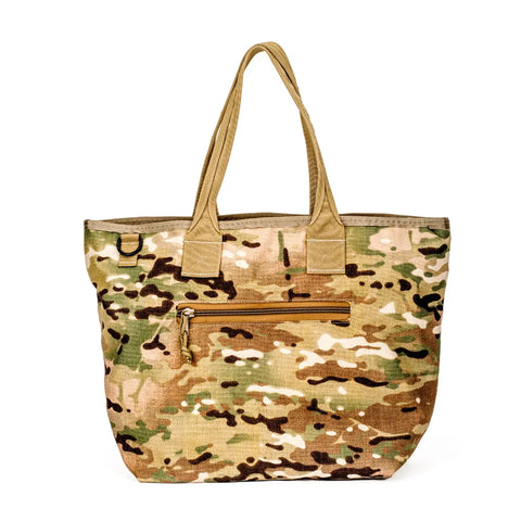 The MIS Tote Bag - Multi Cam is a water-resistant Cordura Nylon bag featuring two handles, a green/brown/beige camouflage pattern, and a front pocket with a heavy-duty zipper.