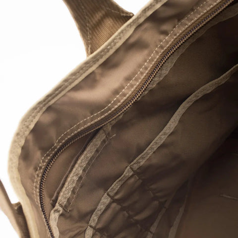 Close-up of the MIS Tote Bag - Multi Cam interior, featuring an open heavy-duty zipper pocket, internal seams, and fabric lining. The empty bag is well-constructed with organized compartments for easy storage.