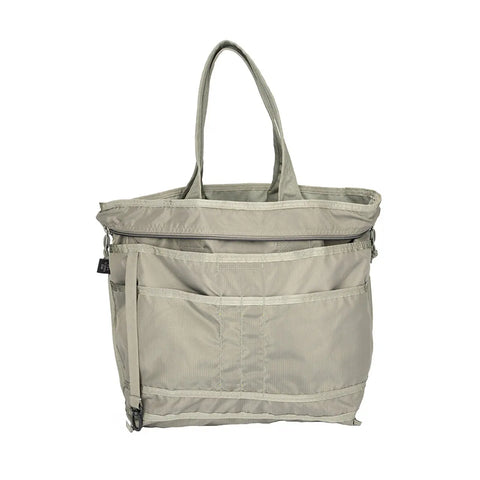 The MIS Tote Bag - Multi Cam is a water-resistant Cordura Nylon tote with a heavy-duty zipper, dual handles, and multiple exterior pockets, shown here against a plain white background.