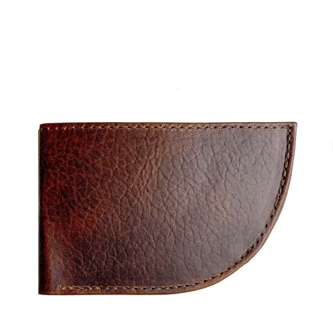The Rogue Industries Nantucket Front Pocket Wallet in Horween Bison, shown closed with visible edge stitching and a slightly curved right flap, is crafted from brown Horween Bison leather and photographed against a white background.