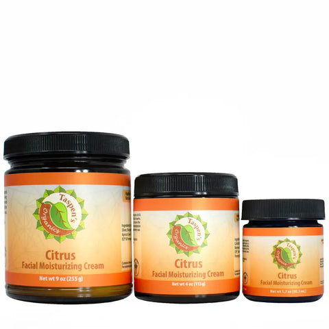 Three jars of Taspen’s Organics Facial Moisturizing Cream in 9 oz, 4 oz, and 1.7 oz sizes are lined up against a white background, each with an orange label and black lid.