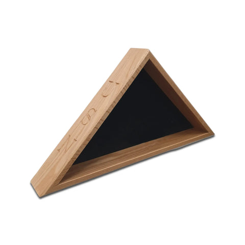 The Navy Veteran USN - Oak Burial Flag Display Case by Legacies of America Woodworking Company displays a 5 x 9.5 flag. Made in the USA, this wooden triangular case features etched symbols and a black inner surface. Plain white background.