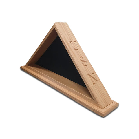 The Navy Veteran USN - Oak Burial Flag Display Case (5 X 9.5 Flag) by Legacies of America Woodworking Company features a triangular oak case with black interior, engraved symbol or letters on one side, and rectangular base. Made in the USA.