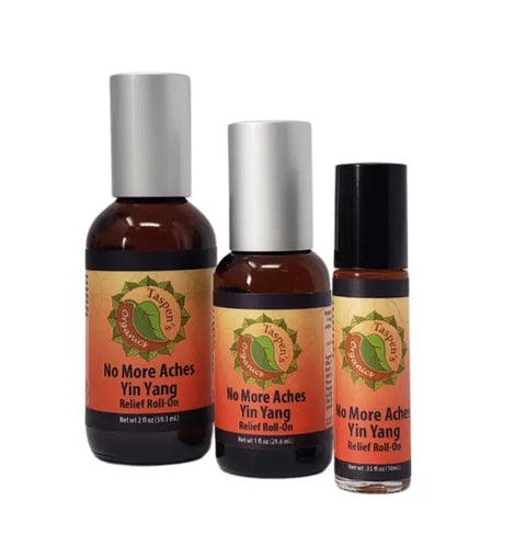 Three bottles of Taspens Organics No More Aches Yin Yang Relief Roll-On in different sizes, each with orange labels and a green leaf logo, provide natural muscle relief and are set against a white background.