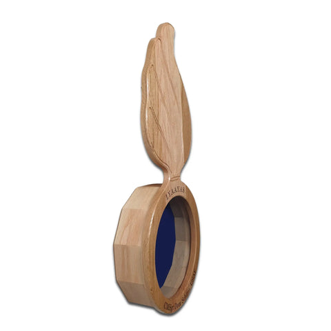The Oak Ammo Pisspot Shadow Box by Legacies of America Woodworking Company is an octagonal oak ring with a blue center, an upright carved feather, engraved text around the edge, and is proudly made in the USA.