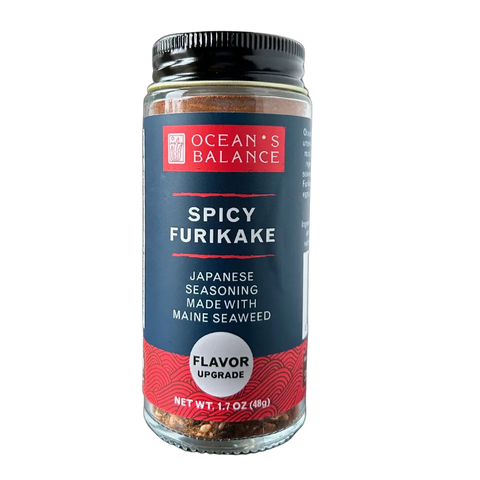 A 1.7 oz (48g) jar of Ocean’s Balance Spicy Furikake, a Japanese-inspired seasoning with regeneratively farmed Maine seaweed, features a red and black label and “Flavor Upgrade” note.