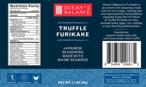 Dark blue label for Ocean’s Balance Truffle Furikake, a Japanese rice seasoning with Maine seaweed. Includes nutrition facts, ingredients, barcode, company info, and a wave pattern at the bottom.