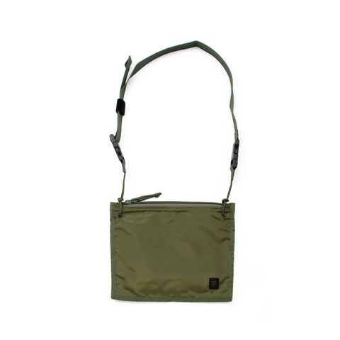 The MIS 2 Way Pouch in Olive Drab is a green rectangular crossbody bag made from water-resistant packcloth nylon, with a zipper closure and adjustable strap, shown against a white background.