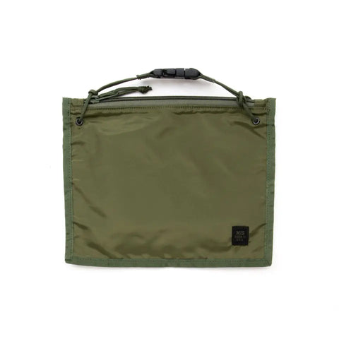 The MIS 2 Way Pouch - Olive Drab is a rectangular, water-resistant packcloth nylon pouch with a zipper closure, drawstring handle, and a small black patch label at the bottom right, designed in a simple, minimalist style.