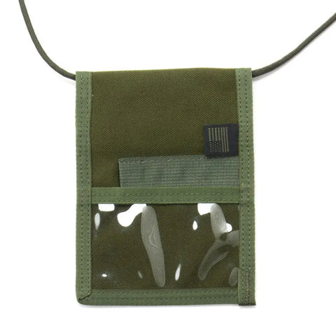 The MIS ID Passport Case in Olive Drab is a Cordura nylon neck pouch with a transparent front pocket, fabric tab, and neck strap—perfect as a compact travel organizer to keep your essentials visible and secure.