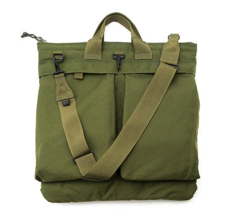 The MIS Flyers Helmet Bag With Alice Strap in olive drab features Cordura nylon, dual handles, front pockets, and a heavy-duty shoulder strap, shown against a white background.