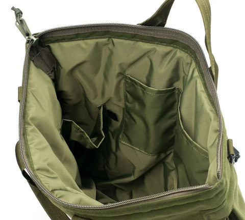 The MIS Flyers Helmet Bag With Alice Strap in Olive Drab features a durable, water-resistant Cordura Nylon build with a zippered top, spacious main compartment, and multiple interior pockets—all lined in matching green for everyday use.