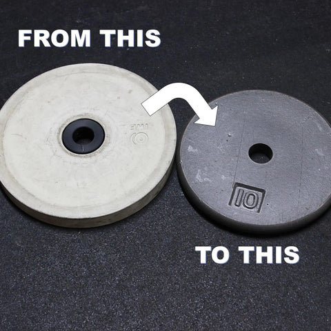 A white FROM THIS plate and a durable dark gray TO THIS plate sit on a dark surface, with an arrow from the white to the gray. Showcasing the Weight It Out Olympic Plate to Standard Bar Adapter (2 to 1).