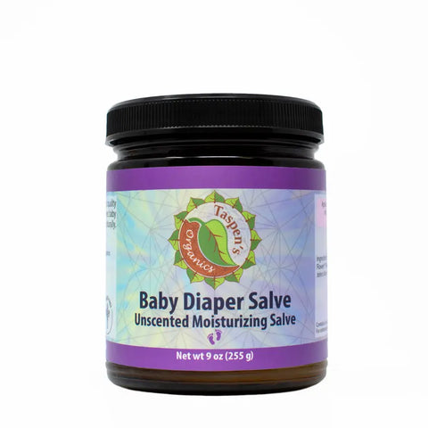 A jar of Taspens Organics Baby Diaper Salve, an unscented, organic diaper rash cream labeled “Baby Diaper Salve Unscented Moisturizing Salve” and “Net wt 9 oz (255 g),” shown on a white background—a gentle baby care essential.